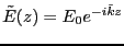 $\tilde{E}(z) = E_0 e^{- i \tilde{k}z }$